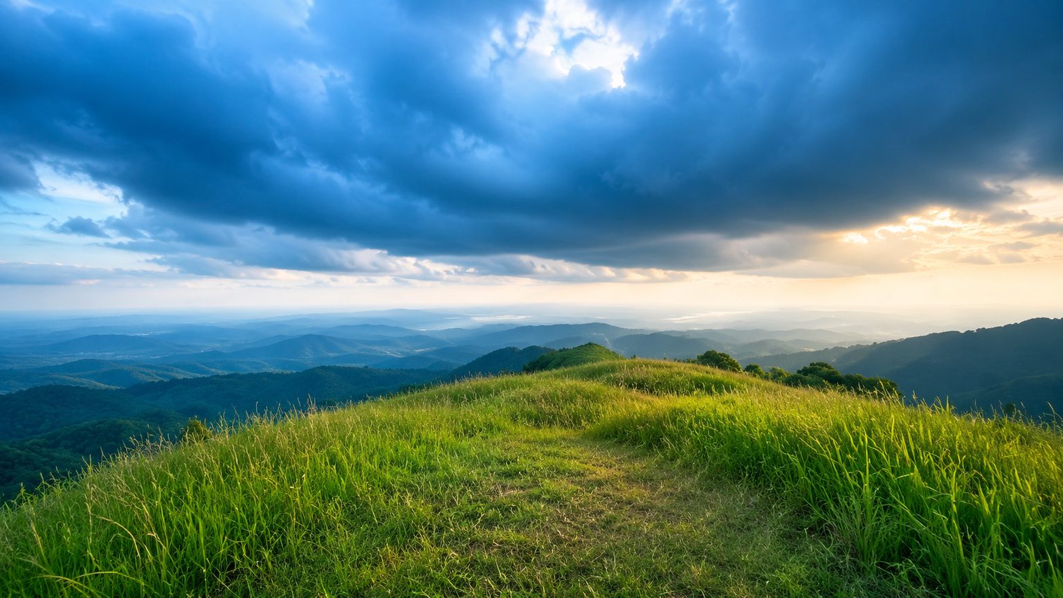 Green hills under an open sky at Sitio Buri in Inhobol, Masinloc