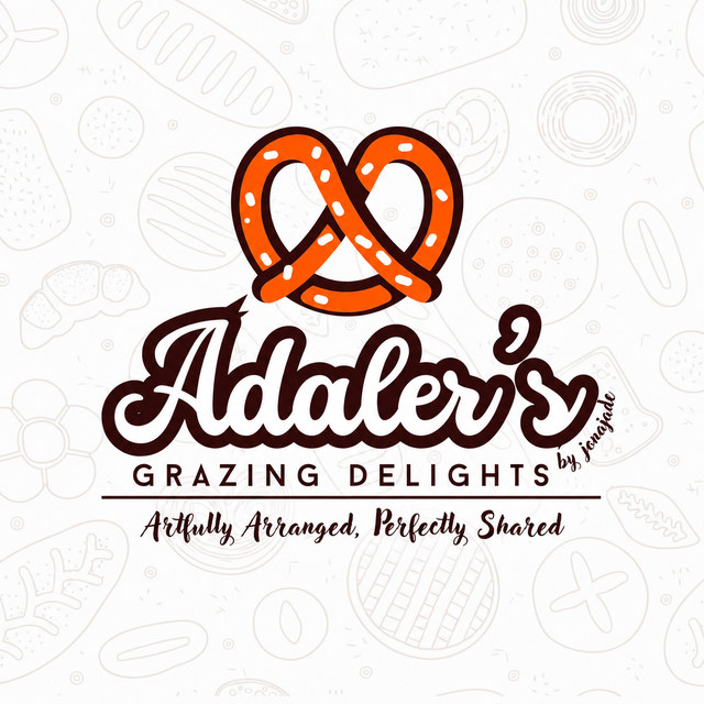 Adaler's Grazing Delights logo: an orange pretzel above the business name and the line Artfully Arranged, Perfectly Shared
