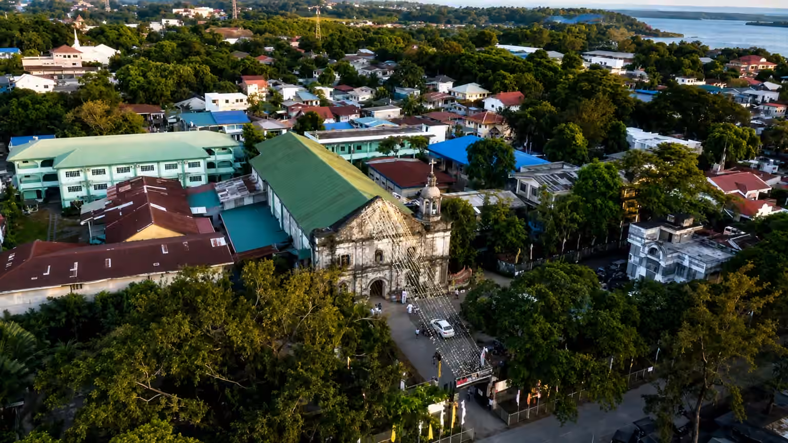 Aerial view of the church and surrounding town of Masinloc, Zambales